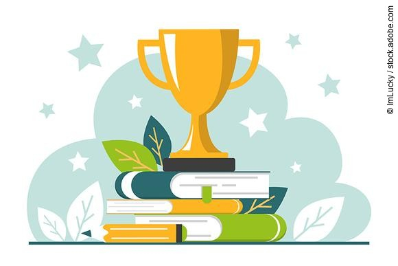 Golden trophy cup standing on the book stack vector isolated.